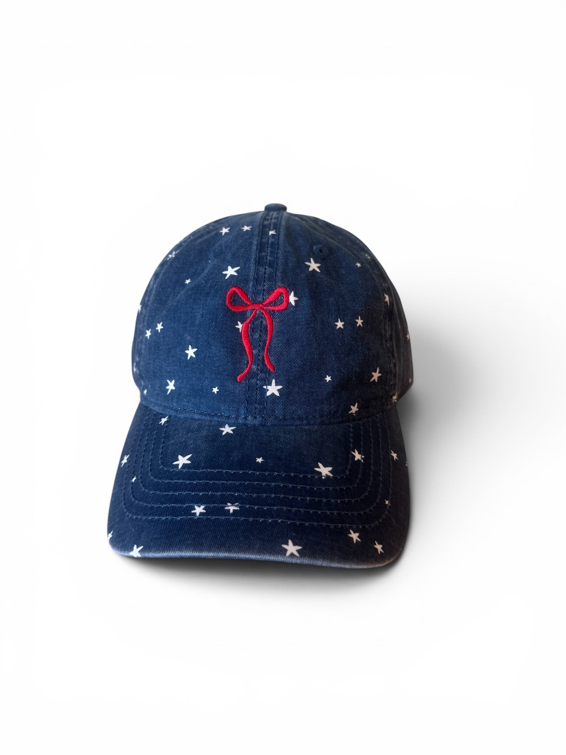 Embroidered bow with stars hat with ponytail opening