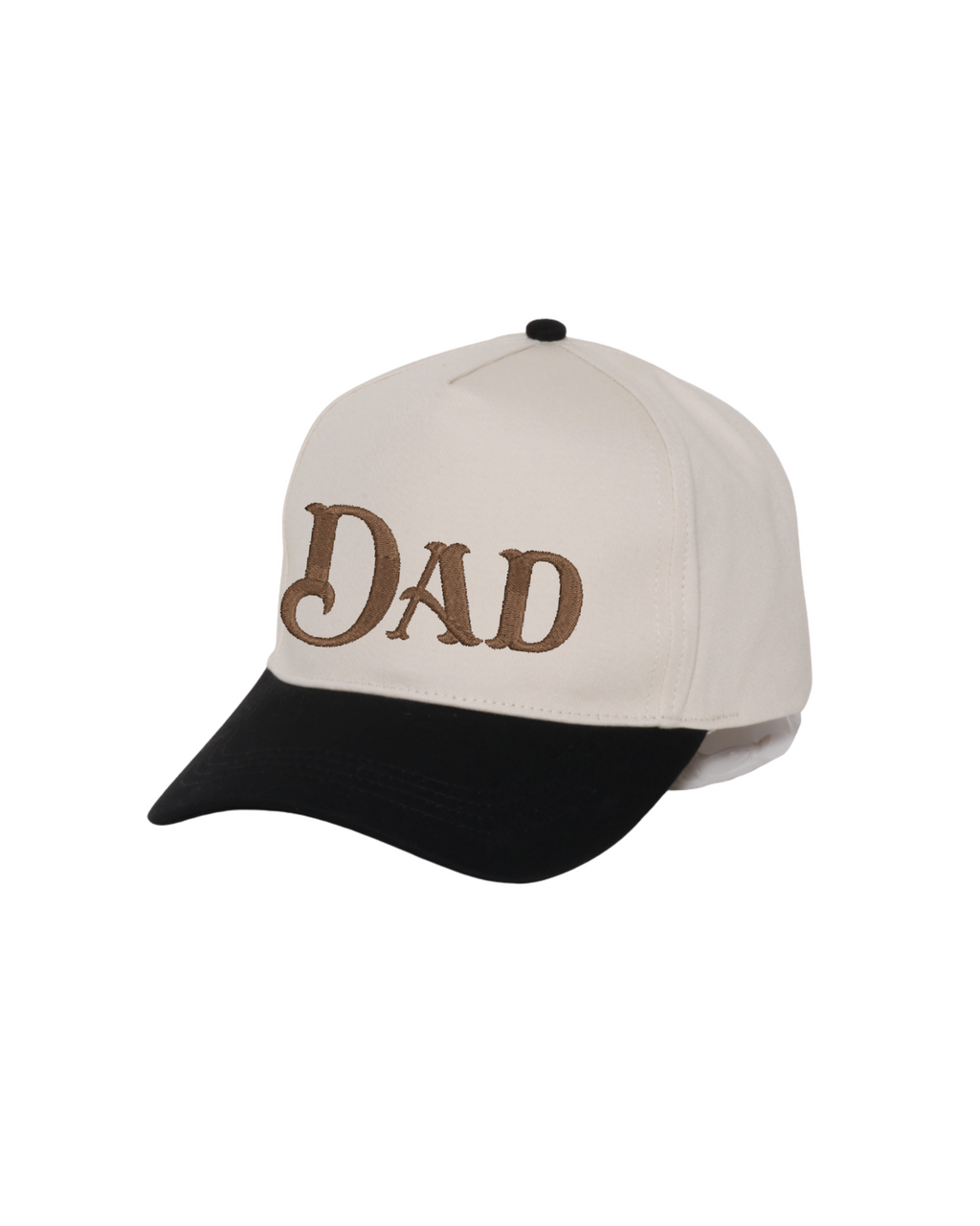 A baseball cap with an off-white crown and a black curved brim, featuring the word 'DAD' embroidered in brown across the front.
