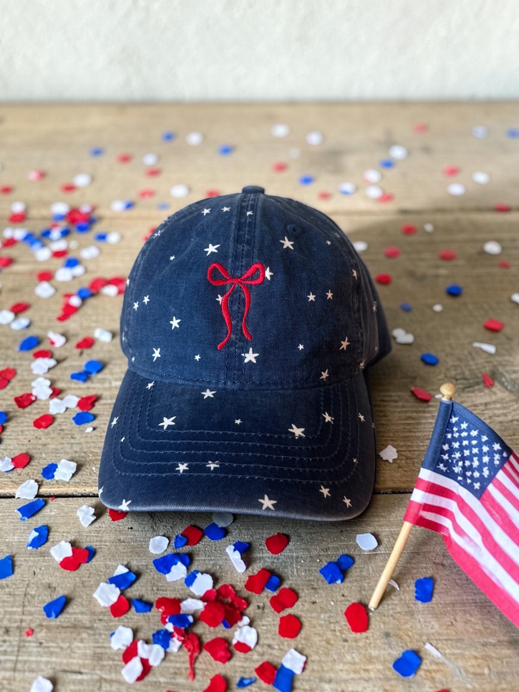 Embroidered bow with stars hat with ponytail opening