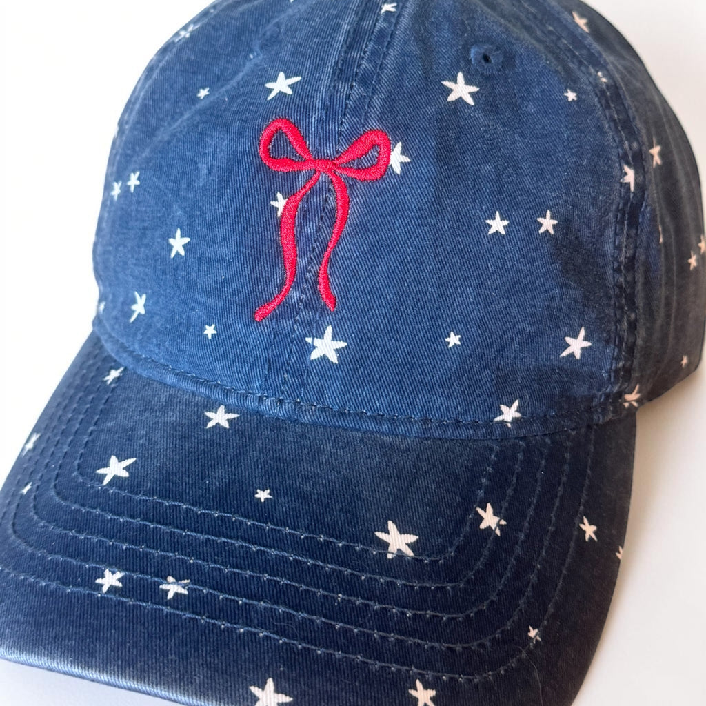 Embroidered bow with stars hat with ponytail opening